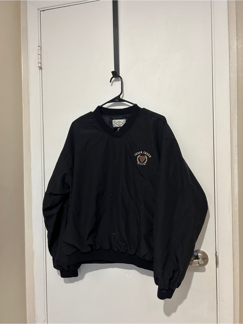 Black vintage 90s Cedar Creek Golf nylon windbreaker